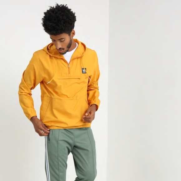 adidas hip packable jacket yellow